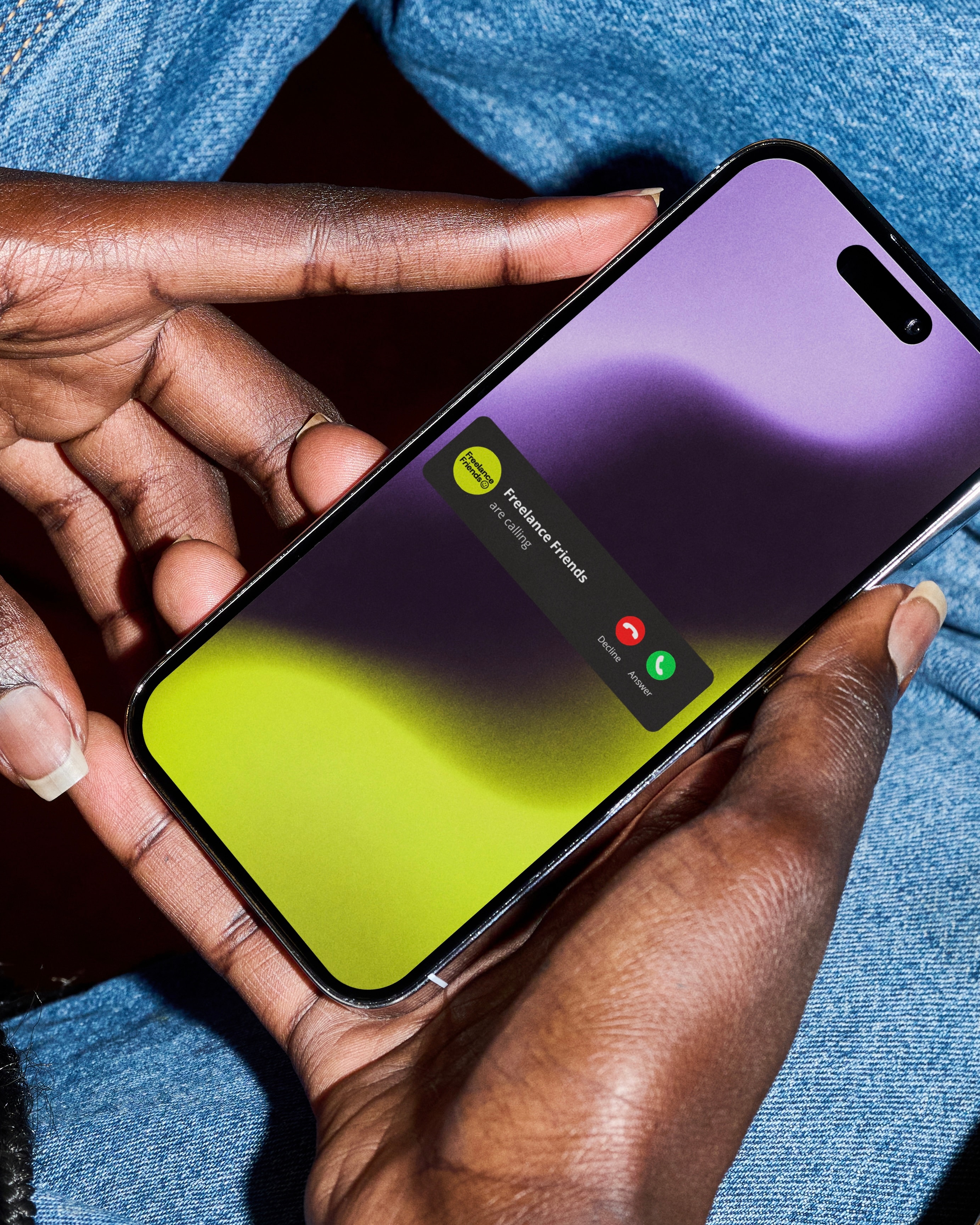 A phone showing an incoming call from Freelance Friends