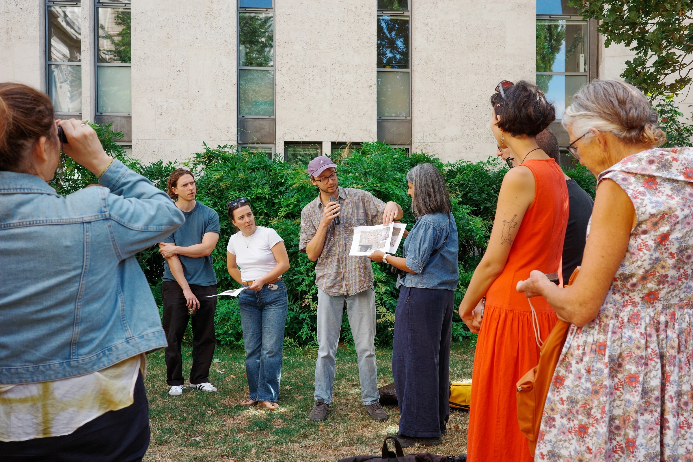 The group gathered in a garden on a Just Looking photography walk