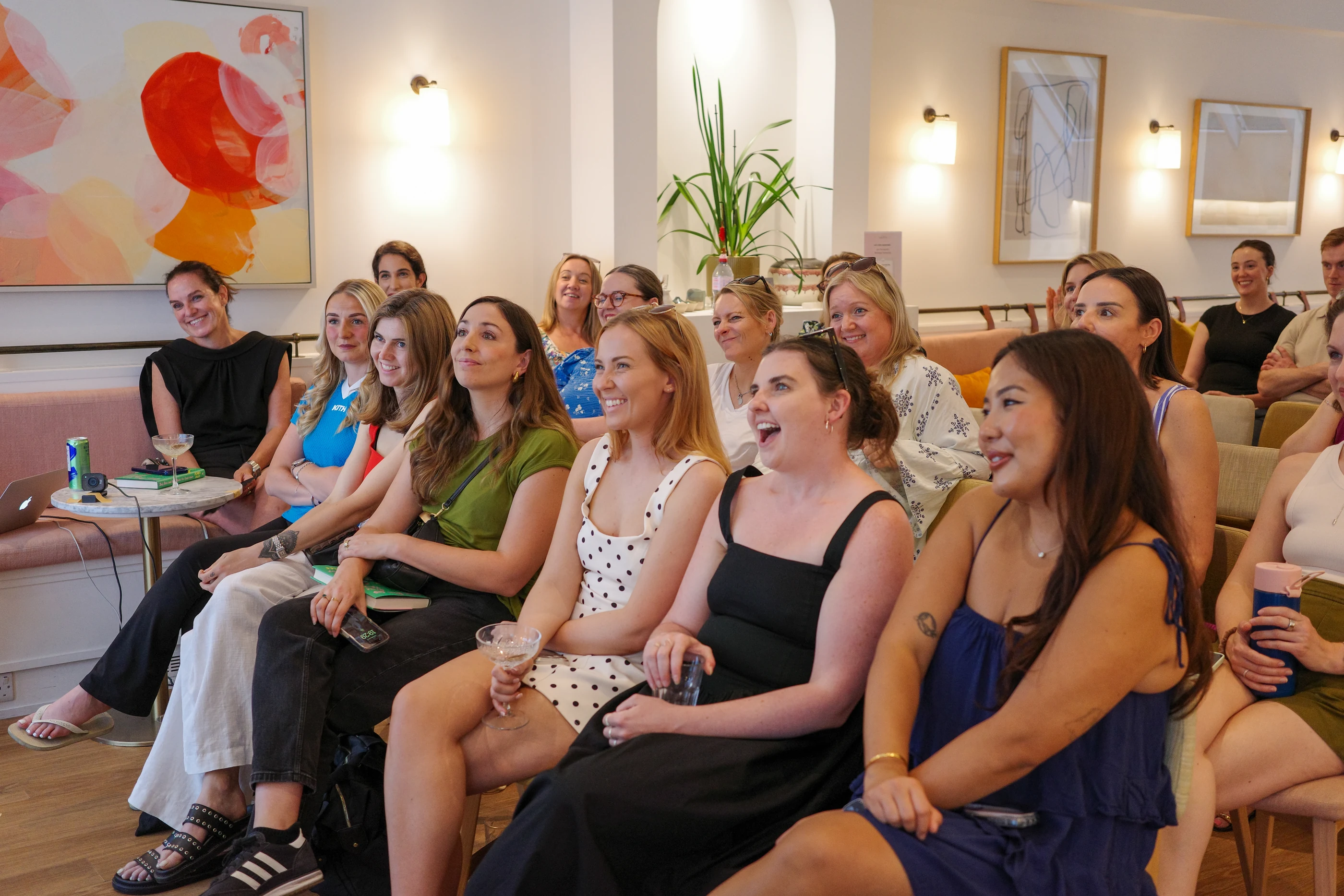 The audience at a Hearth event, laughing